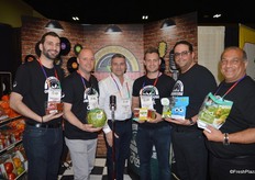 Team Mucci Farms in their Greenhouse Rock booth, designed by Mucci's marketing team. Mucci won first place in the booth contest.