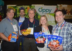 Jim Schneider, Peter Cole, Carl Immenhausen, Audrey Desnoyers and TJ Wilson with Oppy. Audrey and TJ proudly show US grown Jazz apples.