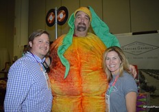 Peach man is flanked by Will McGehee and Lynn Kilroy with Genuine Georgia