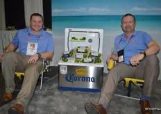 Matt Wentzel and William Ison with Earth Source Trading enjoy a Corono beer with limes in their beach chairs. In the US, Earth Source Trading has the exclusive rights to distribute limes under the Corona brand.