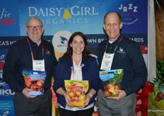 Robb Myers, Danelle Huber and George Harter with CMI Orchards show Kiku, Ambrosia and Organic Galas in pouch bags.