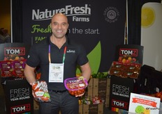 Richie Keirouz with NatureFresh Farms shows TOVs and cherry tomatoes, both grown in Ohio. The tomato crop in Ohio will continue through June and start back up in October. Having production in Ohio in addition to Ontario allow for year-round supplies.