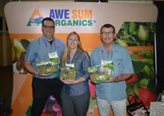 The team of Awe Sum Organics shows organic grapes. From left to right: Brad Stark, Jodi Carkner and Kirk Crane.