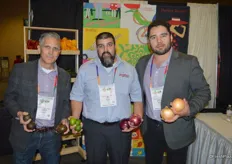 Craig Slate, Frank Camera and Pedro Balderrama with SunFed proudly show SunFed's new products: avocados, limes and onions.
