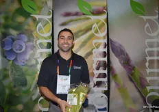 Paul Mortanian with Gourmet Trading Company shows organic asparagus, a new product for the company.