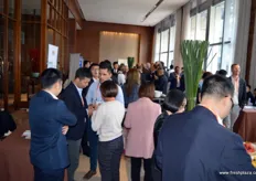 Guests attending PMA Fresh Connections: China are deliberating past lectures and information received.