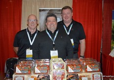 Rob Jackson, Ray Mason and Harold Paivarinta in the booth of Red Sun Farms