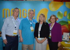 Bright colors in the booth of the National Mango Board. From left to right: Tim Beerup, Dennis Kihistadius, Tammy Wiard and Wendy McManus