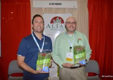 Juan Carrillo and Luis Lopez with Altar Produce show a new product; a 2 lb. bag of green asparagus.
