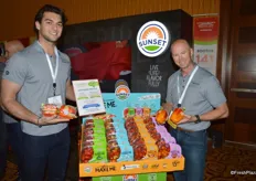 Chip Wujek and John Cameron with Sunset Mastronardi show Aloha peppers. The product was a finalist in the category of most innovative new vegetable products. Between them is a display of You Make Me pasta kits, which is a winning product in the Value-added Solution category.