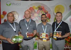Danny Elias, Steve Zaccardi, Ajit Saxena and Joe Spano with Mucci Farms. Ajit and Joe proudly show the award- winning Veggies To Go in the category Most Innovative Vegetable Packaging. Danny and Steve show Naked Leaf lettuce and Smuccies.
