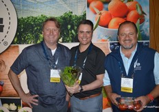 David Karwacki, John Lambiris and Ernesto Maldonado with Star Produce. John shows lettuce from the company's Inspired Greens line and Ernesto shows greenhouse-grown Avalantino tomatoes.