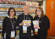 Sabena Khan, Michael Rotter and Jane Rhyno with Highline Mushrooms. Michael proudly shows a top seal package and Jane shows mushrooms in a bag. The bags are all recyclable and work very well to merchandise blends of mushrooms.