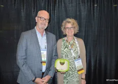 Brad Dennis and Shannon Boase with CKF are walking the floor. Shannon proudly shows a 1.5 lb. home compostable bowl with peel and reseal film.