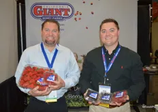 Nick Chappell and Tom Smith with California Giant Berry Farms have a variety of berry products on display. Nick shows a 4 lb. clamshell of strawberries for club stores and foodservice. California Giant will be significantly expanding its raspberry production. Starting in the fall of this year and into 2019, the company's Mexican raspberry production will increase tenfold.
