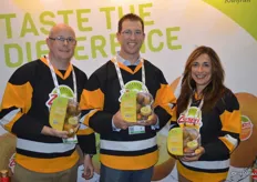 The Zespri team is promoting SunGold kiwi fruit. The fruit is on the water on its way from New Zealand to North America. Within three weeks, retailers in the US and Canada should have good supplies in stores. Last year, SunGold consumption grew 25% in Canada and 36% for all of North America. Glen Arrowsmith, Ben Hughes and Debbie Rogers show topseal clamshells with 2lb. SunGold kiwifruit.