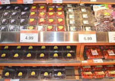 A large selection of berries, all on promotion.