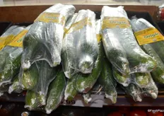 Two long English cucumbers packaged together. Local and greenhouse-grown in Delta, BC.