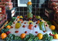 Fresh juices on display at store entrance.