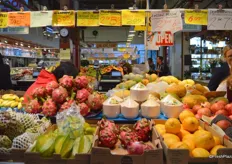 Overview of exotic products like star fruit, dragon fruit and coconuts at the Market.