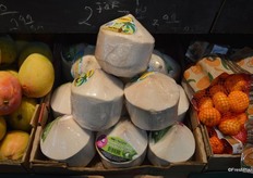 Young coconuts imported from Thailand.