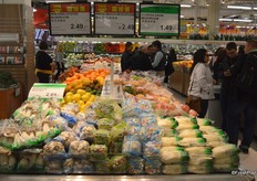 Different mushrooms in bags: King Oyster, Brown and White Shimeji as well as Enoki. They are all imported from Korea.