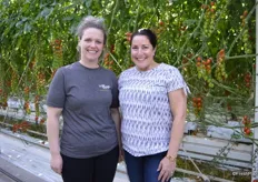 Assistant Grower Leesa Garnett and Director of Brand Marketing & Communications, Helen Aquino in the Delta, BC greenhouse. Leesa and Helen are standing in front of the Heavenly Villagio Marzano variety.
