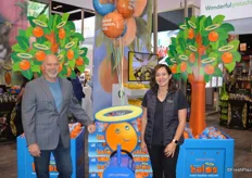 Michael Celani and Diana Salsa with Wonderful Citrus. The trees and tractor were offered as promotional displays to retailers during Wonderful's Halo season.
