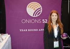 Falon Rufty with Onions 52 shows a single-wrapped onion. The new packaging helps differentiate organic onions from conventional onions at the store level. PLU stickers easily come off onions.