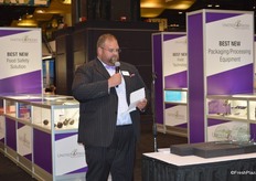John Toner with United Fresh presents the Innovation Awards.