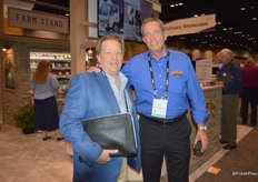 Brett Burdsal with Suntreat is walking the floor and meets with Naturipe Farms' Dwight Ferguson.