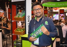 Diego Morales with Don Limon America shows a mesh bag of limes.