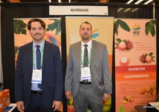 Lorenz Hartmann de Barros and Michael Napolitano with HLB Specialties have a range of organic products on display, including papayas, limes and ginger.