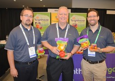 The team of NatureSweet Tomatoes proudly shows grape tomatoes, bell peppers, mini sweet peppers and a grape tomato medley from the company's brighthouse organics line. From left to right: Matt Burnett, Jim McErlean and David Ferman.