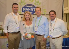 Alex McCloskey, Kimberley St. George, Jeff Freeman and Jeff Hutterer with Mann's, Del Monte Fresh Company. Kim shows an organic vegetable tray.