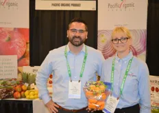 Tim Carruesco and Amy Rosenoff with Pacific Organic Produce. Amy shows organic mandarins that just arrived from Peru.