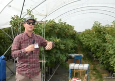 Parker Weiss explains to the group why Driscoll's is moving into container farming for berries.