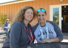 Sara Palmisano with C&S Wholesale Grocers and Raquel Mello with Hapco Farms attend the Driscoll's tour.