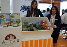 Evangelina Sanchez and Elizabeth Sandoval, Altar Produce at the Mexican pavillion. Presenting different products from their assortment, such as the green asparagus.