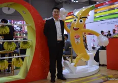 General manager Sun Yanshu standing next to their company mascotte.
