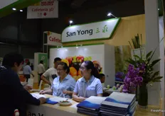 San Yong staff helping clients at their counter