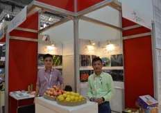 To the right, Mike Pong with his manager from Meishan Crystal Fruits Co., Ltd.