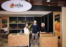 Noppie Nikolaidou and two of his employees for the company Prima Greek Fresh Fruits. They deal in apples, oranges and kiwis. 