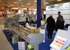 Novatec's stand, they showed off their machinery that wraps the produce in plastic.