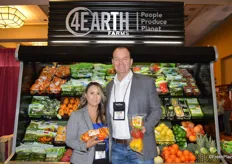 Valerie Gonzales and Dave Hewitt with 4Earth Farms show Fiesta peppers and a 3 ct. organic pepper. 
