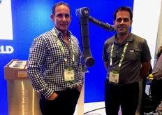 Barry Campagnolo and Richard Green from Visy Industries displaying the company's new collaborative robot system.