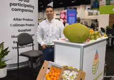 Yasmani Garcia with Sweet Seasons has several produce items from Mexico on display, including jackfruit.