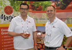 Alejandro Santander and Tony Otto with MagicSun show two new products: mixed tomatoes and organic grape tomatoes.