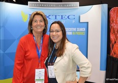 Cindy Jewell with California Giant and Emily Fragoso with Mixtec Group are smiling for a photo op.