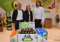 The team of Avocados from Mexico in front of a Superbowl display: Oscar Garcia, Tanya Edwards and Ryan Fukuda.